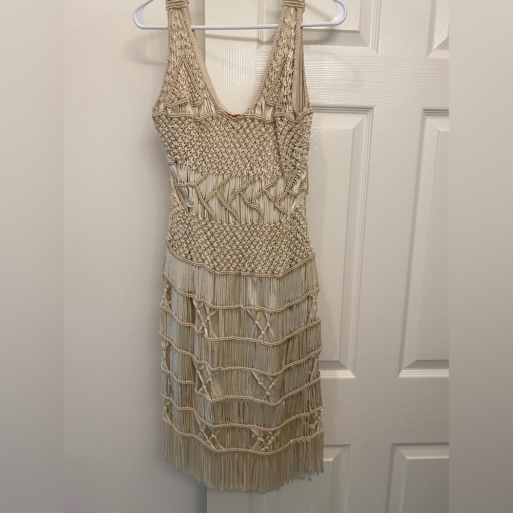Exquisite fringe crochet silk midi dress in shimmery cream color.